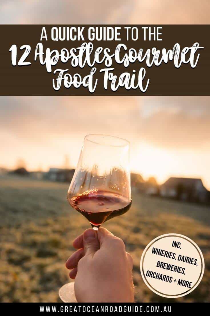 12 Apostles Gourmet Food Trail Pin Image of a woman holding a glass of red wine up to the sunset in a field