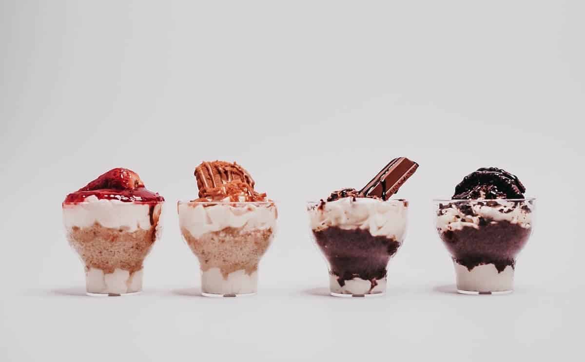 Quick Guide to the 12 Apostles Gourmet Food Trail header image of 4 mini desserts set out in a row in front of a white background